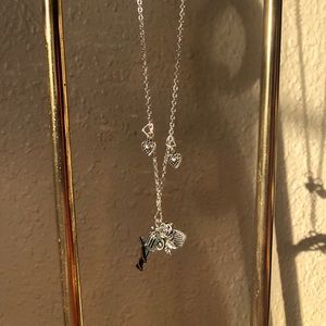 Beautifully handmade Guns N’ Hearts necklace 🦋